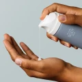 nu-skin-ageloc-wellspa-io-serum-in hands-image.webp